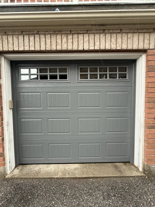 Grey carriage style door with windows